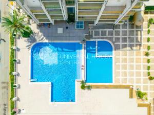 Bazén v ubytování UHC Novelty Apartments nebo v jeho okolí