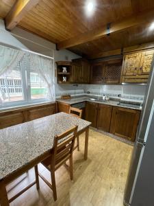 Η κουζίνα ή μικρή κουζίνα στο Apartamento La Veiga