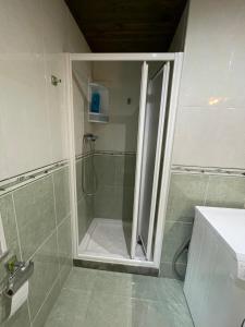 Ένα μπάνιο στο Apartamento La Veiga
