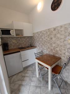 Kuchyňa alebo kuchynka v ubytovaní Apartments Novacic