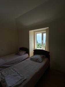 Postel nebo postele na pokoji v ubytování Temo's Guesthouse
