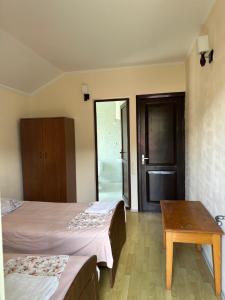Postel nebo postele na pokoji v ubytování Temo's Guesthouse