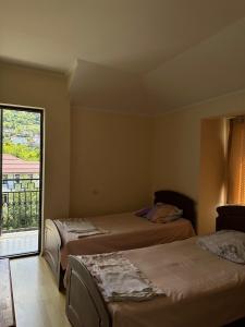 Postel nebo postele na pokoji v ubytování Temo's Guesthouse