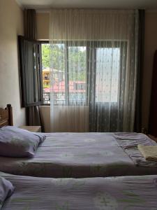 Postel nebo postele na pokoji v ubytování Temo's Guesthouse