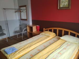 Postel nebo postele na pokoji v ubytování Smaidas apartamenti