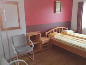 Postel nebo postele na pokoji v ubytování Smaidas apartamenti