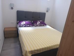 Krevet ili kreveti u jedinici u objektu Marin Apartments