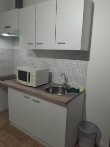 Kuchyň nebo kuchyňský kout v ubytování Studio Cosy - Cœur Perpignan1