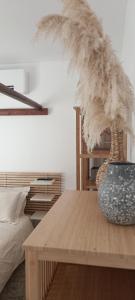 a room with a table with a vase on it at Nafplio Lodge in Nafplio +66 photos
