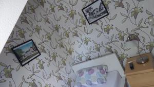 Postel nebo postele na pokoji v ubytování Zimmer Lummerland