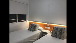 A bed or beds in a room at Bahia Colon