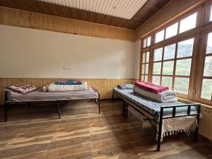 Bros Hostel & Cafe, Sissu客房内的一张或多张床位