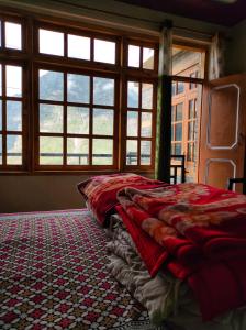 Bros Hostel & Cafe, Sissu客房内的一张或多张床位