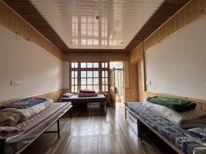 Bros Hostel & Cafe, Sissu客房内的一张或多张床位