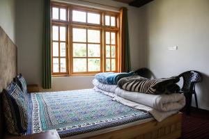 Bros Hostel & Cafe, Sissu客房内的一张或多张床位