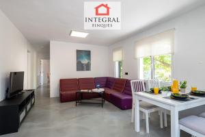 a living room with a couch and a table at Villa Celeste in Vall-Llobrega