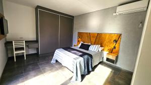 Postel nebo postele na pokoji v ubytování OlivaNegra Resort - Oliva1 + 37 fotografií