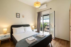 Postel nebo postele na pokoji v ubytování M&N Penthouse