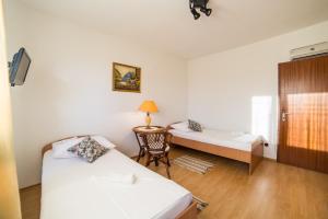 Postel nebo postele na pokoji v ubytování Apartment Mande