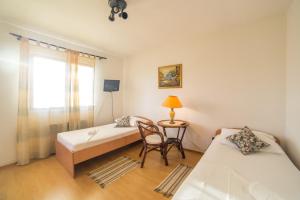 Postel nebo postele na pokoji v ubytování Apartment Mande