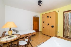 Postel nebo postele na pokoji v ubytování Apartment Mande