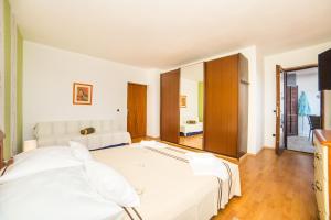 Postel nebo postele na pokoji v ubytování Apartment Mande