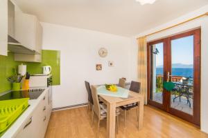 Kuchyň nebo kuchyňský kout v ubytování Apartment Mande