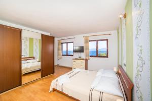 Postel nebo postele na pokoji v ubytování Apartment Mande