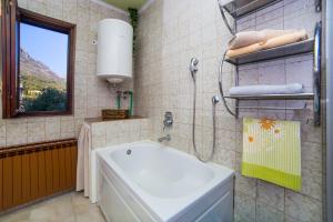 Koupelna v ubytování Apartment Mande