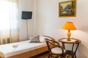 Postel nebo postele na pokoji v ubytování Apartment Mande