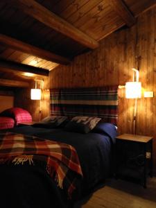 Postel nebo postele na pokoji v ubytování Casa delle Volpi + 8 fotografií