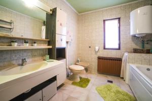 Koupelna v ubytování Apartment Mande