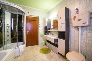 Koupelna v ubytování Apartment Mande