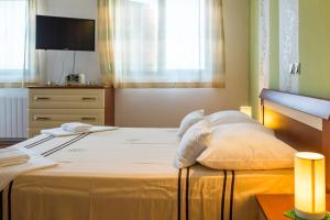 Postel nebo postele na pokoji v ubytování Apartment Mande