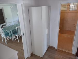 a room with a table and a dining room at Villa Arija Brela in Brela