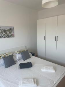 Postel nebo postele na pokoji v ubytování Laganini apartman Rab