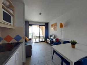 Kuchyňa alebo kuchynka v ubytovaní CASA MORENA - vue mer