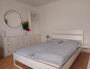 Ένα ή περισσότερα κρεβάτια σε δωμάτιο στο Ferienwohnung Leonhardbauer +29 φωτογραφίες