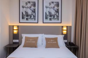 Cama ou camas em um quarto em PATIO MARE