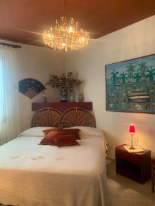 Ένα ή περισσότερα κρεβάτια σε δωμάτιο στο Casa Boutique Angelika