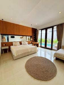 Ένα ή περισσότερα κρεβάτια σε δωμάτιο στο Asania Villa Ungasan