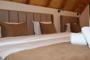 Postel nebo postele na pokoji v ubytování Chalet Kujta