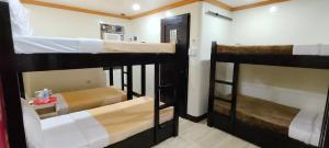 Postel nebo postele na pokoji v ubytování ISLAND VIEW SUITES
