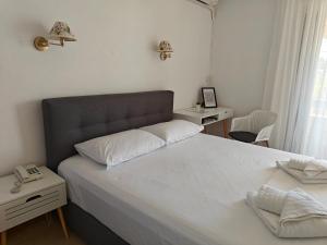 Postel nebo postele na pokoji v ubytování Hotel Rania