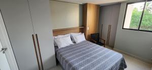 En eller flere senge i et værelse på Blue Beach Praia Formosa + 32 billeder