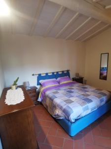 Ένα ή περισσότερα κρεβάτια σε δωμάτιο στο Casa di Dorothy stanza vicino a Firenze +5 φωτογραφίες