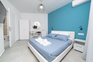 Postel nebo postele na pokoji v ubytování Bluegreen eco studios