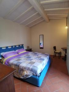 Ένα ή περισσότερα κρεβάτια σε δωμάτιο στο Casa di Dorothy stanza vicino a Firenze