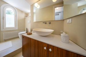 a bathroom with a bowl sink on a counter at PETITE PARAGGI Vista e Comodità sul Mare in Santa Margherita Ligure +31 photos