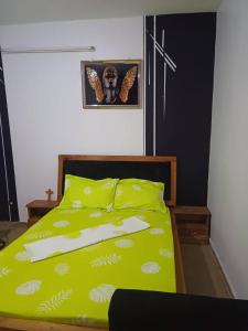 Ένα ή περισσότερα κρεβάτια σε δωμάτιο στο Les résidences grâce